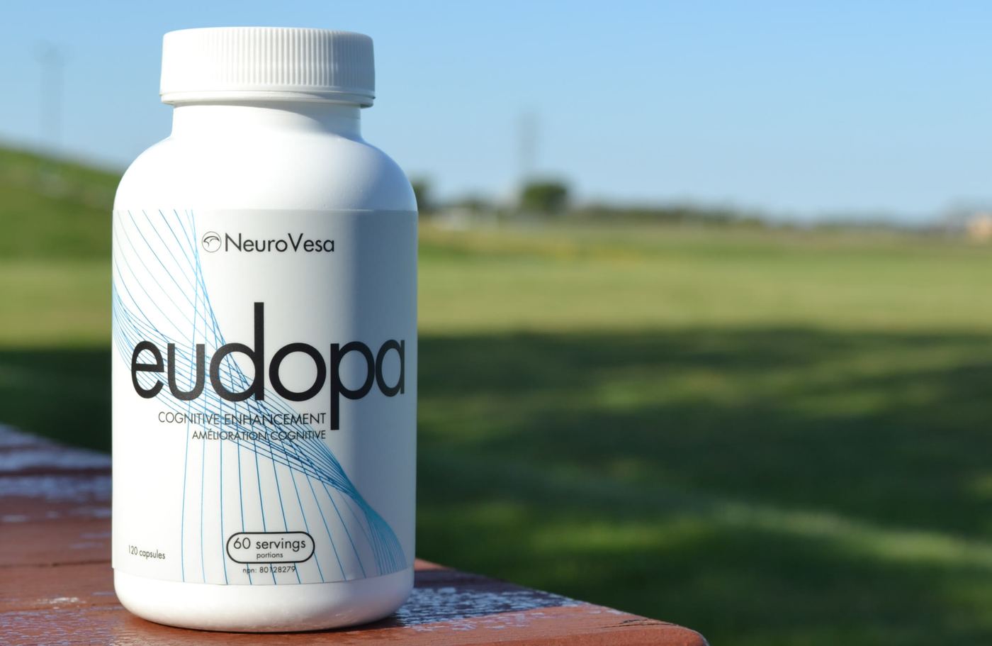 eudopa bottle on a deck rail